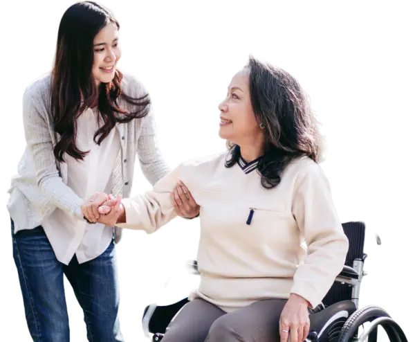 woman smiling and assisting senior