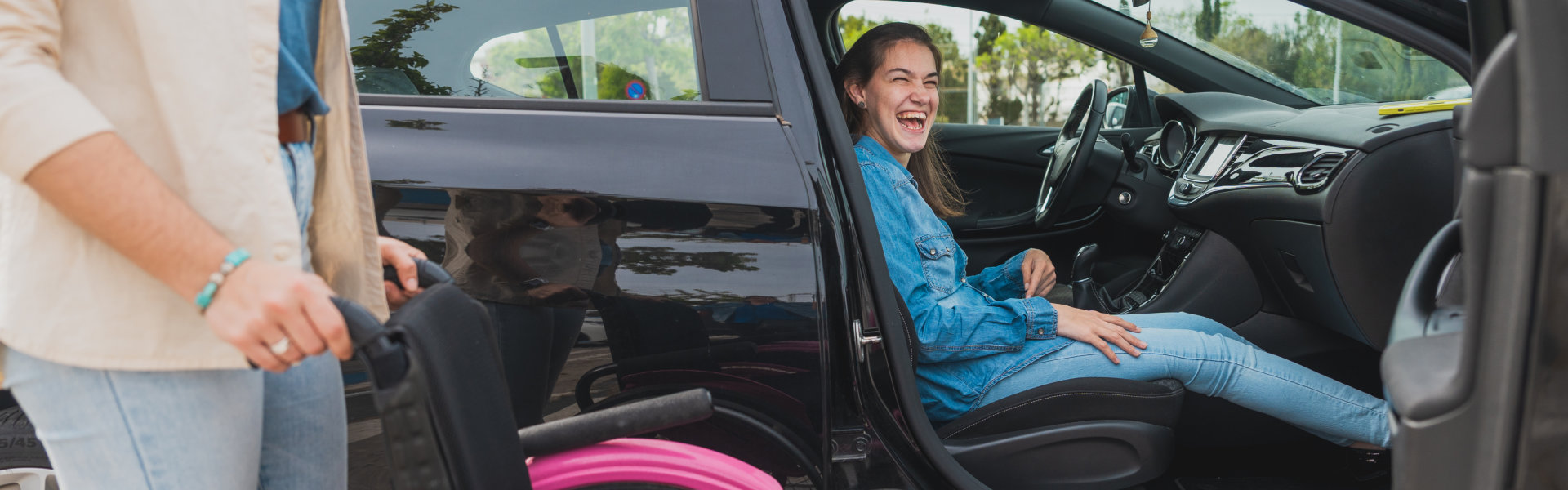 woman smiling inside vehicle